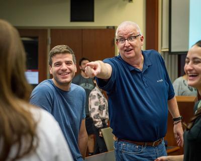 Professor Tim West demonstrates his animated teaching style in class.