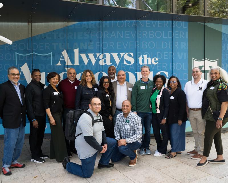 Tulane Black Alumni Pose in front of the A.B. Freeman Business School