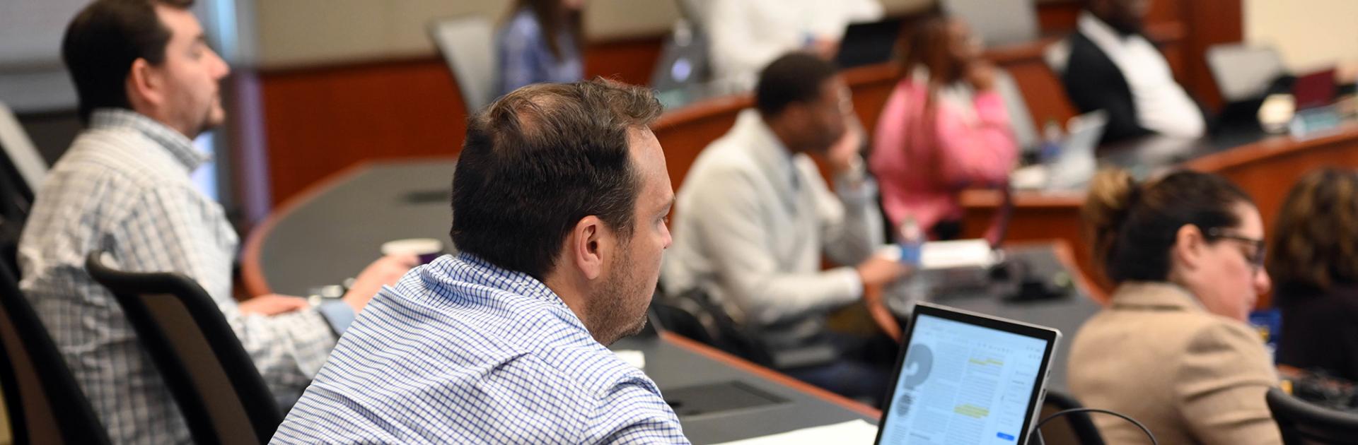 photo of executive MBA students in a GWBC classroom