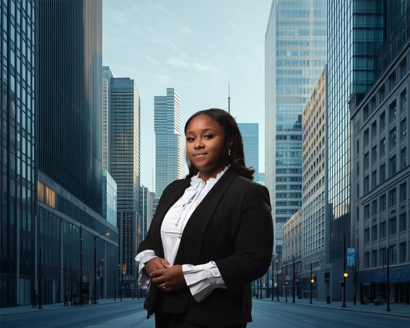 Freeman student Morgan Greene standing in front of the New Orleans Central Business District.