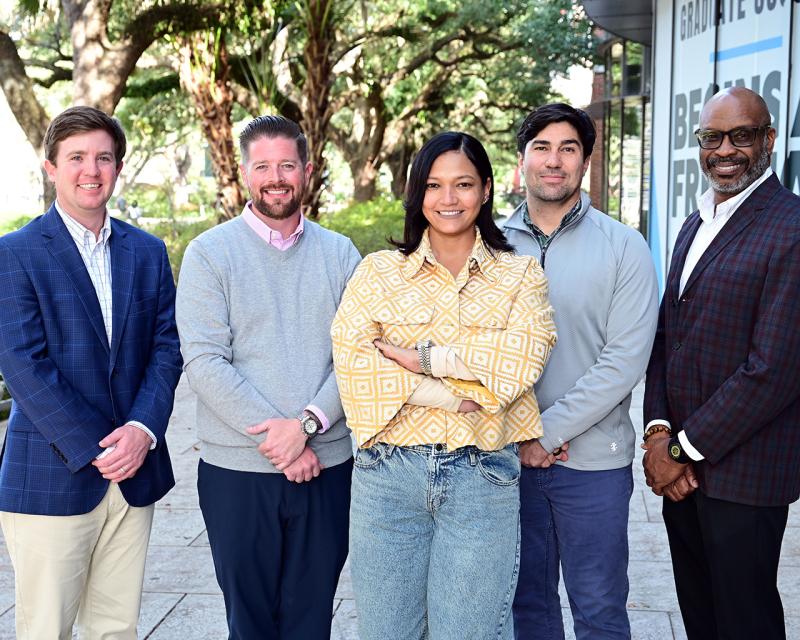 EMBA students standing outside the GWBC Spring 2025.